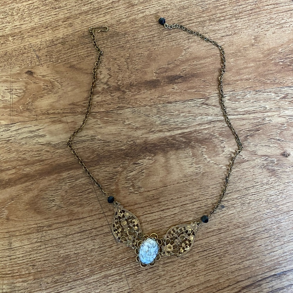 Vintage gold necklace with stone